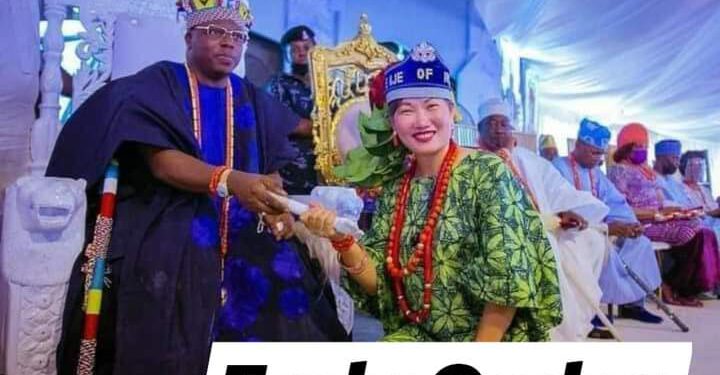 ERELU TINUADE FROWNS AT THE INSTALLATION OF A CHINESE WOMAN AS IYALAJE OF IRU-LAND