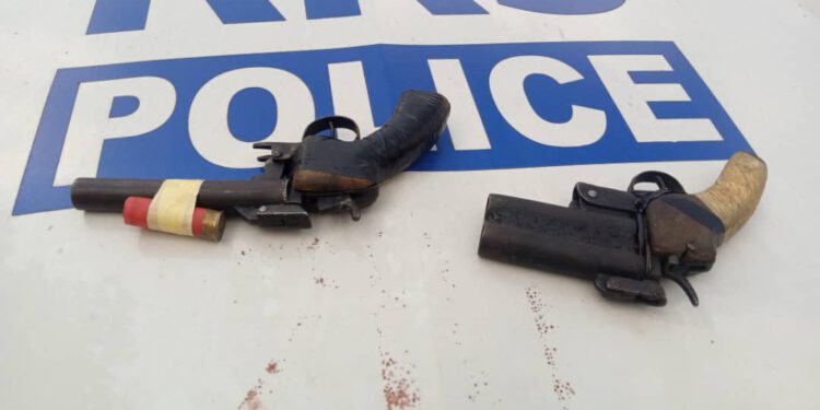 FLEEING ROBBERS ABANDON ARMS: AS POLICE RECOVERS PISTOLS, EXPENDED CARTRIDGE