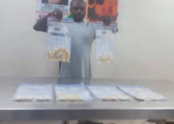 Choked by ingested drugs, India-bound passenger vomits, excretes 80 wraps of cocaine